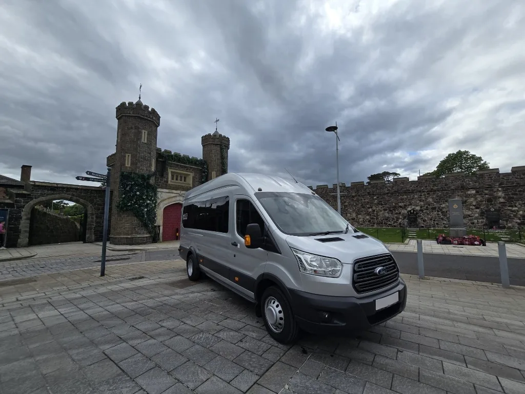 Silver Ford Transit 16-seater minibus from Ace Cabs Antrim, group transport and school runs across Northern Ireland