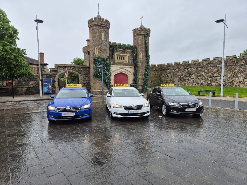 Ace Cabs licensed taxi saloons with ACE roof signs for SEN and home-to-school transport in Antrim, Northern Ireland