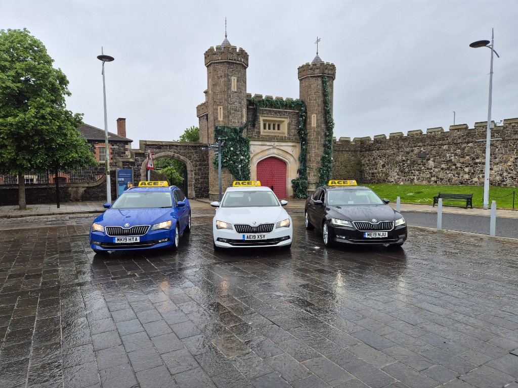 Ace Cabs licensed taxi saloons with ACE roof signs for SEN and home-to-school transport in Antrim, Northern Ireland