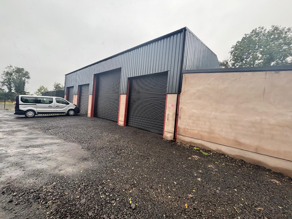 Ace Cabs fleet vans outside the company service centre in Antrim